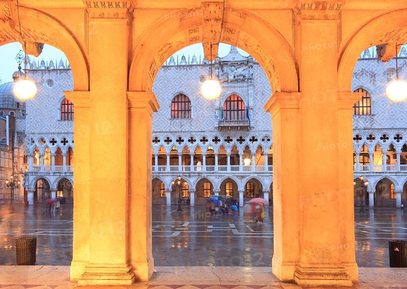 West façade of the Doge's Palace in the evening in rain, San Marco, Venice, Veneto, Italy