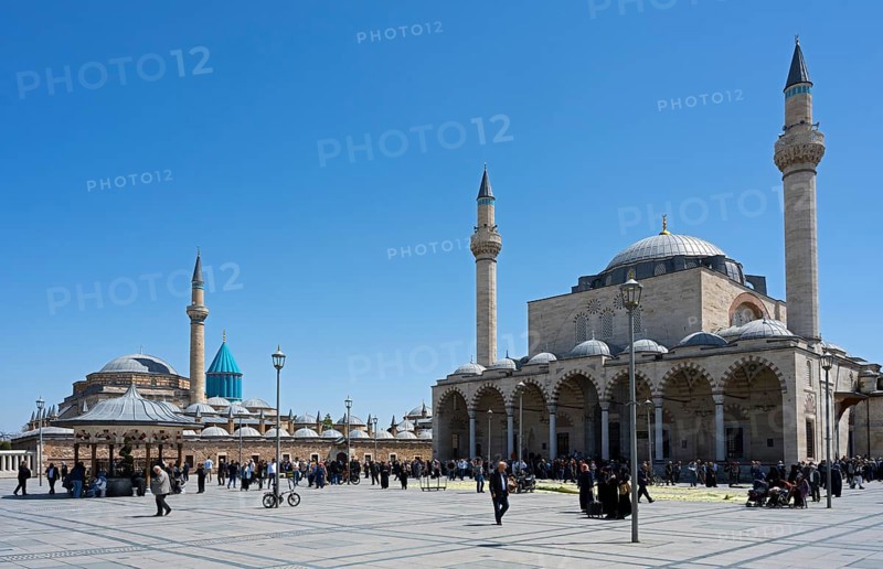 Large square in front of a mosque with people in a quiet atmosphere, Mevlana Museum, Mevlana, landmark, mausoleum of Mevlânâ Jalal ad-Din Rumi, Konya Sultan Selim Camii, Konya, Central Anatolia, Turkey