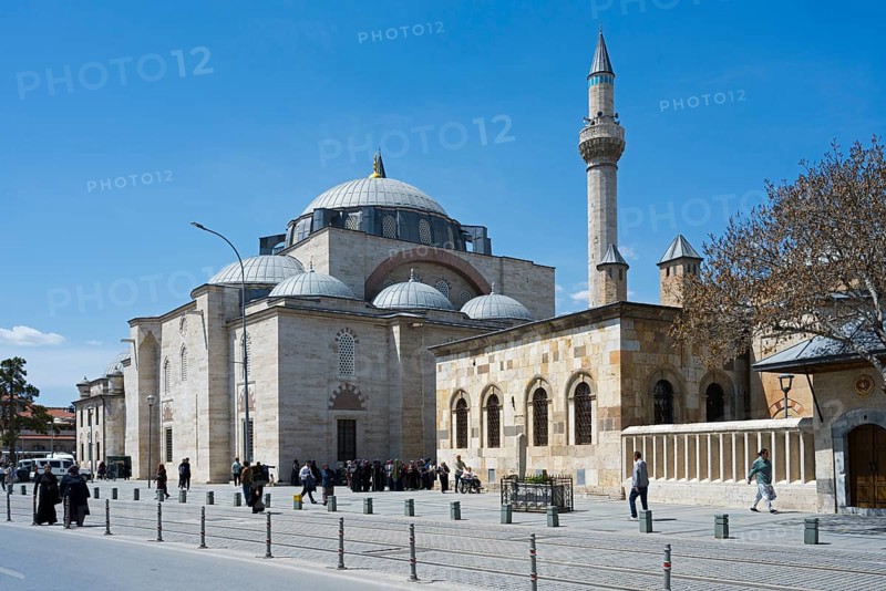Historic mosque with minaret, many people animate the surrounding area, Mevlana Museum, Mevlana, Mausoleum of Mevlânâ Jalal ad-Din Rumi, Konya Sultan Selim Camii, Konya, Central Anatolia, Turkey