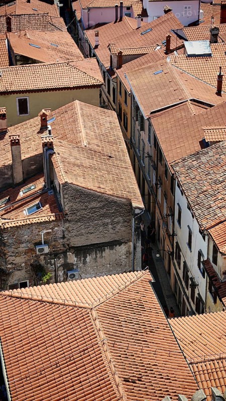 Narrow streets and old houses with red roofs from a bird's eye view, Koper, Slovenia