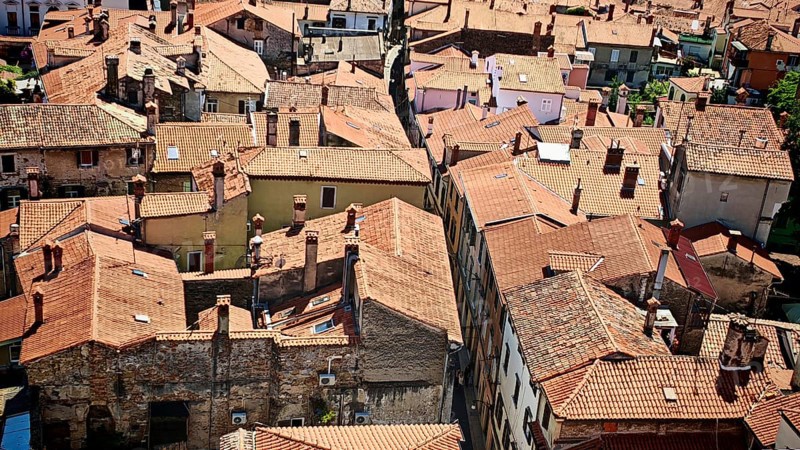 View over the rooftops of the old town of Koper with red tiles and narrow streets, Koper, Slovenia