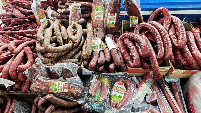 Different types of sausages offered for sale at a market, Skopje, North Macedonia
