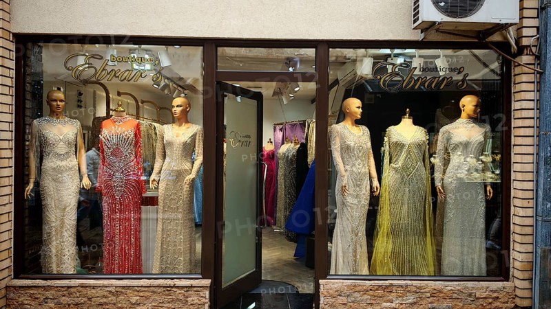 Elegant evening dresses in a boutique shop window, Ohrid, North Macedonia