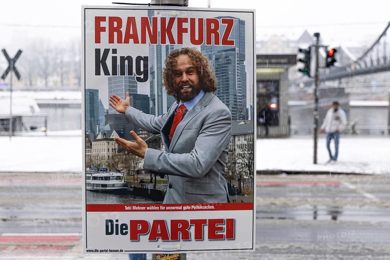 An election poster Fankfarz King - The Party hangs on a lamppost on the banks of the Main in Frankfurt. The Hessian state government has set March 15, 2026 as the election day for local elections in Hesse. On this day, the elections of the City Council and the 16 local advisory councils will take place in Frankfurt am Main, Germany