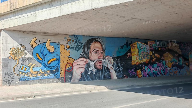 Graffiti and street art under an underpass, colorful and urban, Pristina, Kosovo