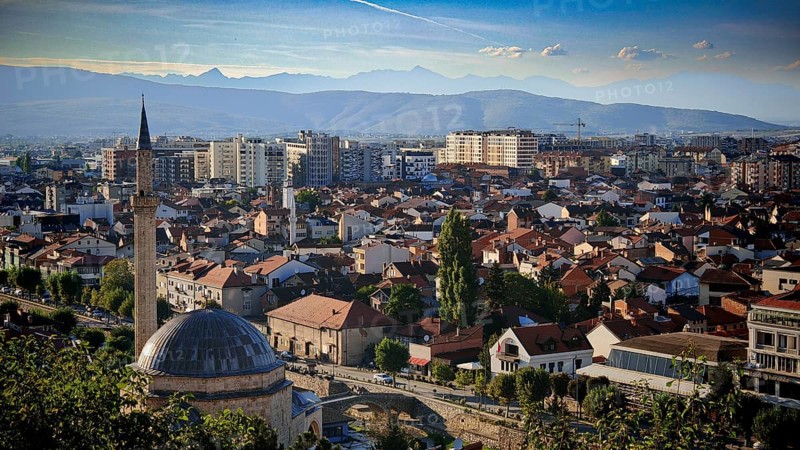 Panoramic view of a city with mosque and background mountains, Prizren, Kosovo