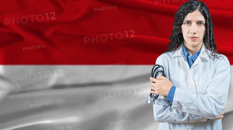 Monegasque national health system, Medical professional on Monaco flag background