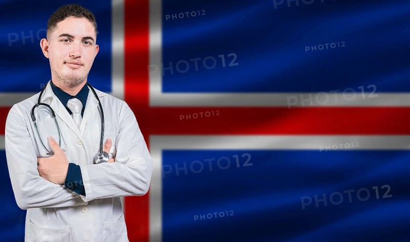 Portrait of medical professional on Iceland flag background. Icelandic national health system