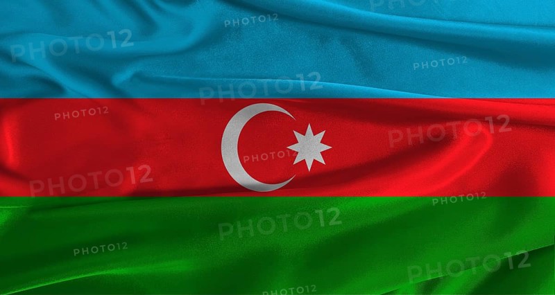 Flag of Azerbaijan with fabric textured background. Close up of National flag of Azerbaijan with realistic texture