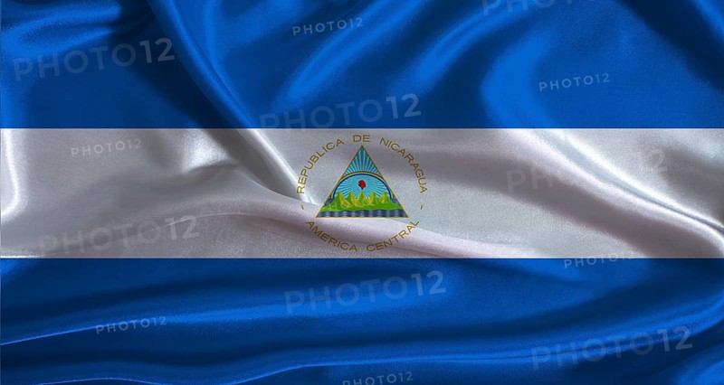 Nicaragua flag with cloth textured background. National flag of Nicaragua with realistic texture