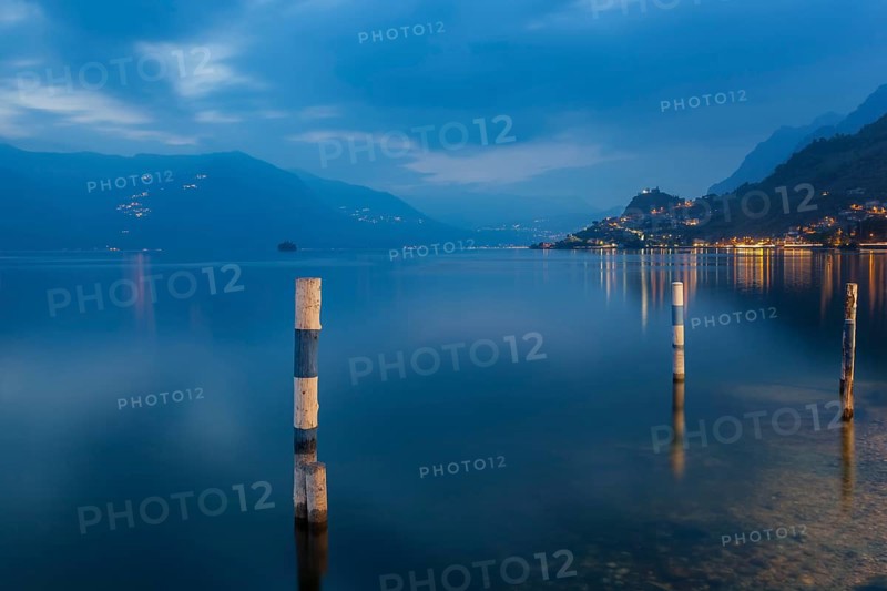 Iseo Lake, Lombardy, North Italy. Lake Iseo s placid water in the evening light