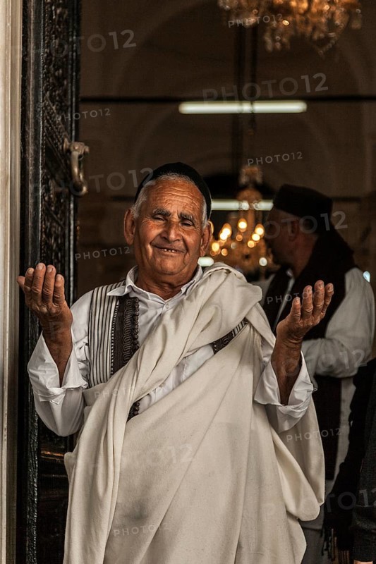 Tripoli, Libya, North Africa. An elderly Libyan man at the door of a Mosque