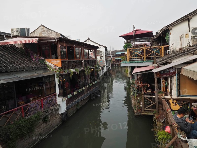 Rustic canal view with cozy decorated cafes and a sense of serenity, Zhujiajiao Ancient Town, Shanghai, China