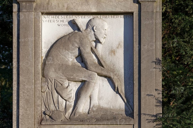 Grave relief old man with walking stick, Nordfriedhof Düsseldorf, North Rhine-Westphalia, Germany
