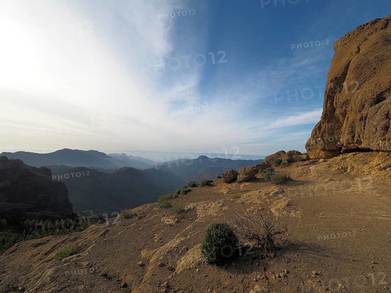 Wide, rocky landscape with views of distant mountains under blue sky, Roque Nublo, Gran Canaria, Canary Islands, Canary Islands, Spain