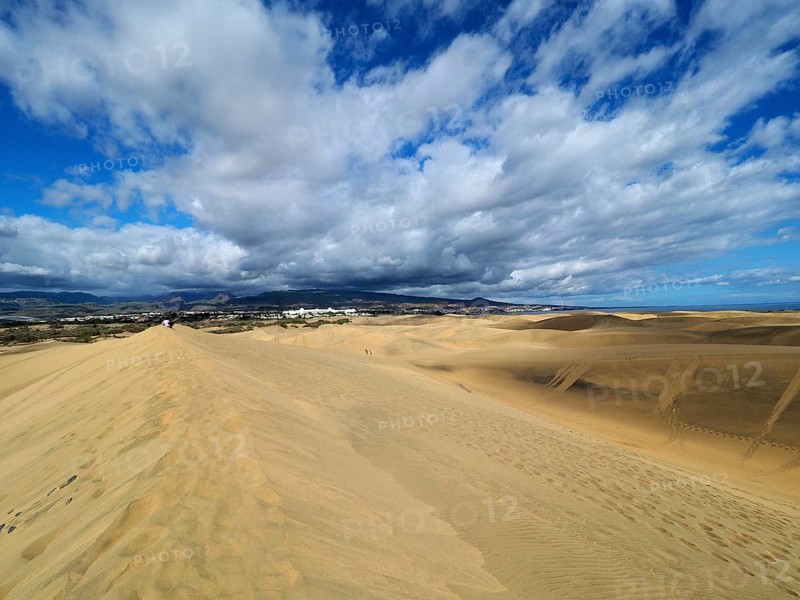 Wide sand dunes under a cloudy sky, Maspalomas Dunes, Gran Canaria, Canary Islands, Spain