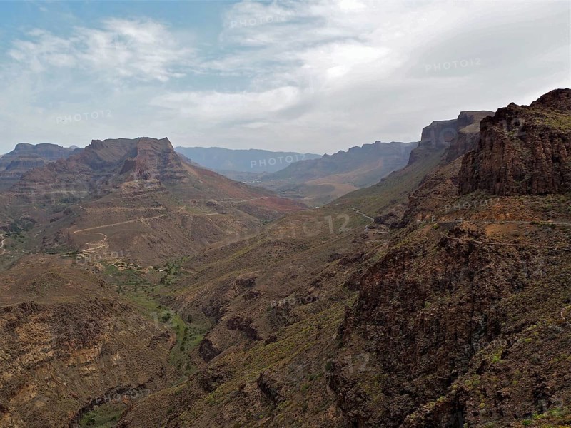 Dry mountain landscape with distinctive rocks under cloudy sky, Degollada de las Yeguas, Gran Canaria, Canary Islands, Canary Islands, Spain