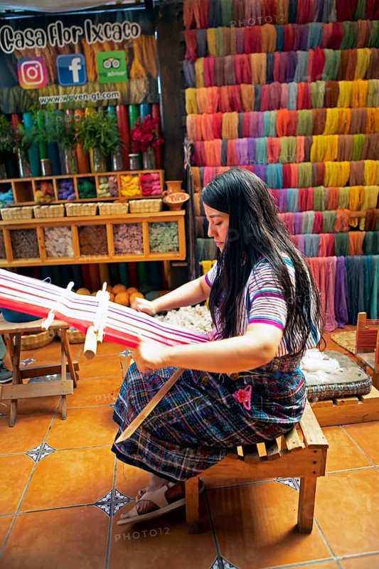 Maya woman, 42 years old, weaving with a back strap, traditional craft in a woman's cooperative, San Juan la Laguna, Atitlán, Sololá Department, Guatemala