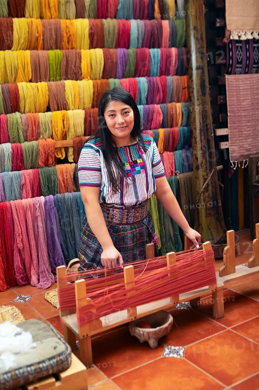 Maya woman, 42 years old, working on a weaving frame, traditional crafts in a woman's cooperative, San Juan la Laguna, Atitlán, Sololá Department, Guatemala
