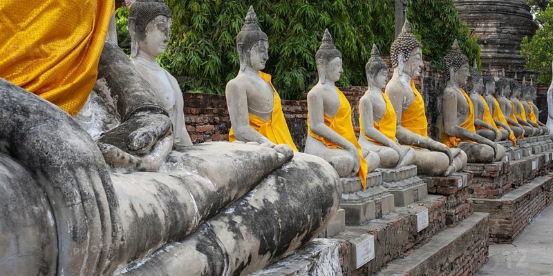 Buddha statues around the Great Chedi Chaya Mongkol, Wat Yai Chai Mongkon, Ayutthaya, Thailand