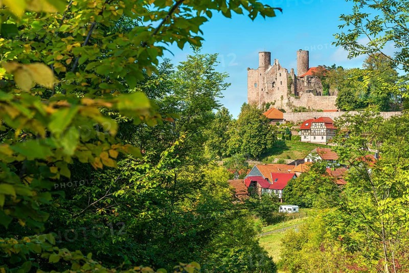 View of the ruins of Hanstein Castle and the small village of Rimbach with half-timbered houses, Bornhagen, Eichsfeld, Thuringia, Germany