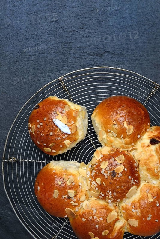 Epiphany cake with king on wire rack, Switzerland