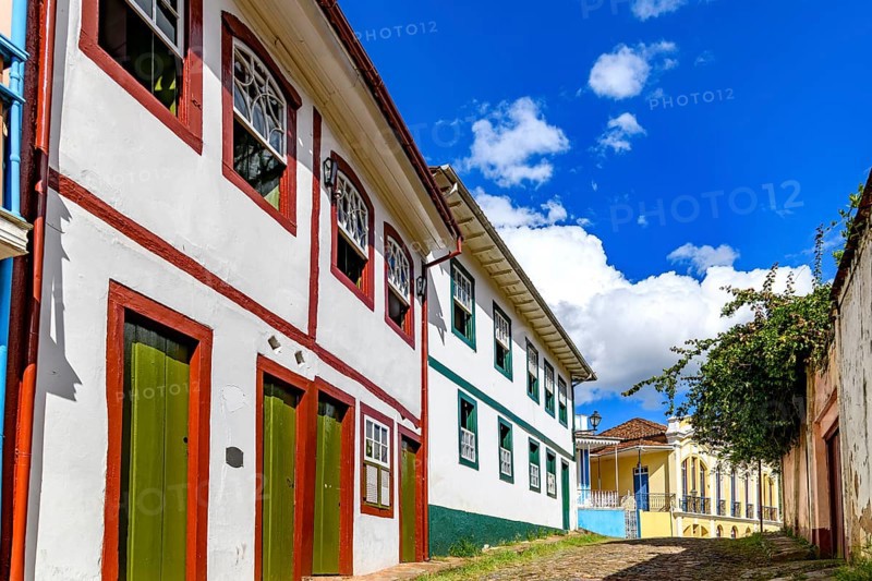 A slope lined with old colonial style mansions in the historic city of Ouro Preto, Ouro Preto, Minas Gerais, Brazil
