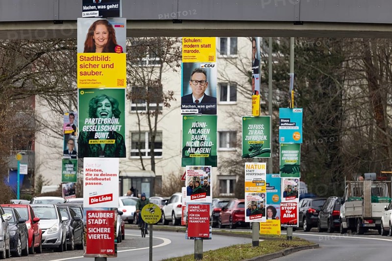 Numerous election posters for the 2026 local elections are hanging one behind the other on several lamp posts in the northwest of Frankfurt. The Hessian state government has set March 15, 2026 as the election day for the local elections in Hesse. On this day, the elections of the City Council and the 16 local advisory councils will take place in Frankfurt am Main, Germany