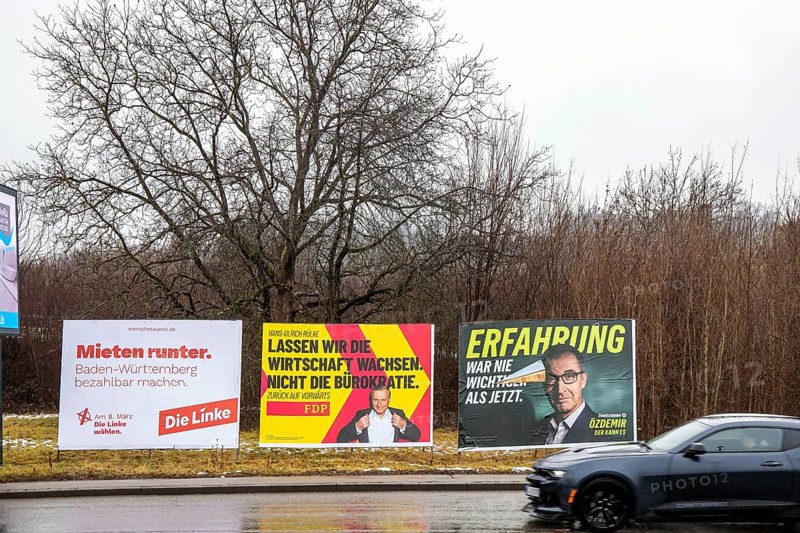 Large posters of the parties Die Linke, FDP, Grüne am Strassenrand. Top candidate Cem Özdemir. Kirchheim unter Teck, Baden-Württemberg, Germany