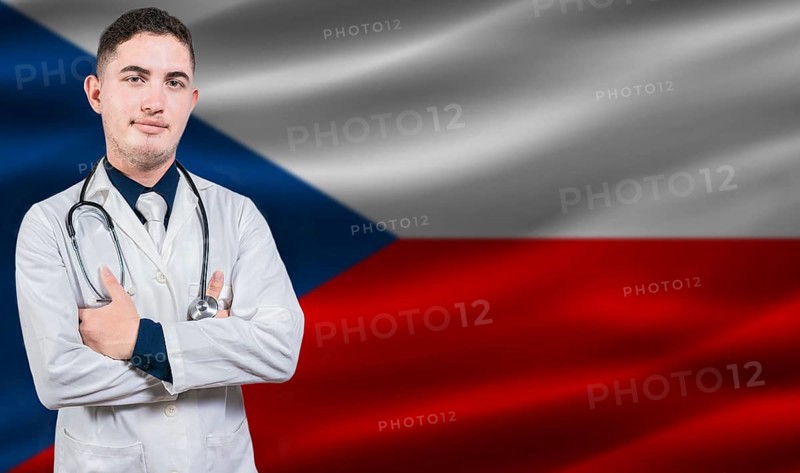 Portrait of medical professional on Czech Republic flag background. Czech national health system