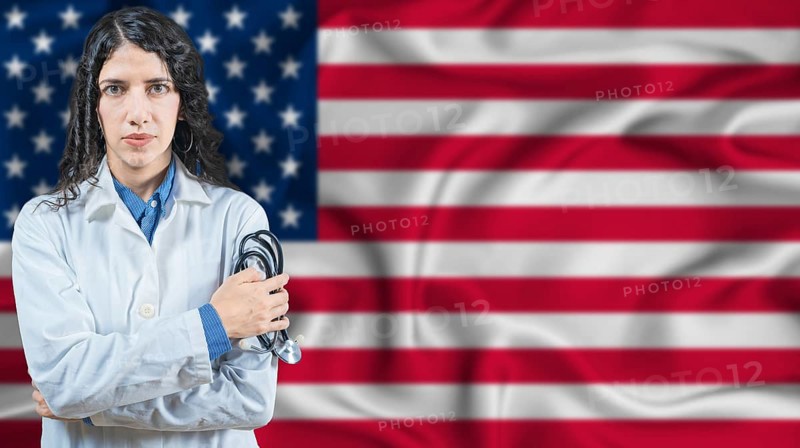 American national health system, Medical professional on United States flag background