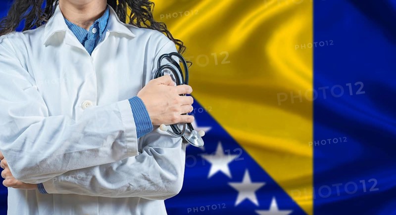 Healthcare professional with Bosnia and Herzegovina flag background. Professional doctor holding stethoscope on Bosnia and Herzegovina flag background