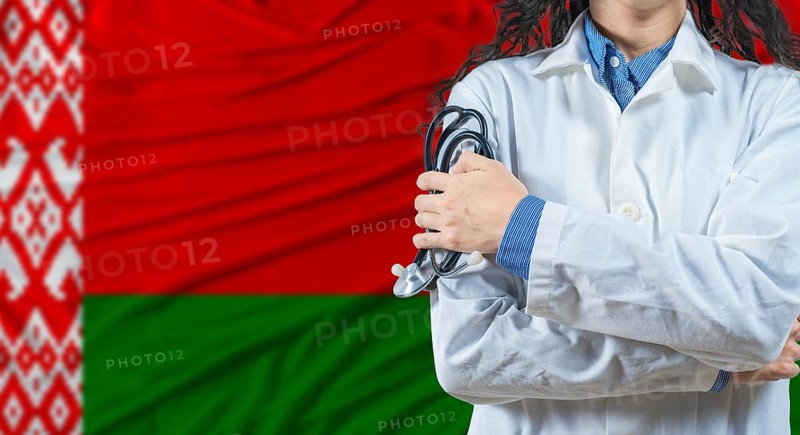 Healthcare professional with Belarus flag background. Professional doctor holding stethoscope on Belarus flag background