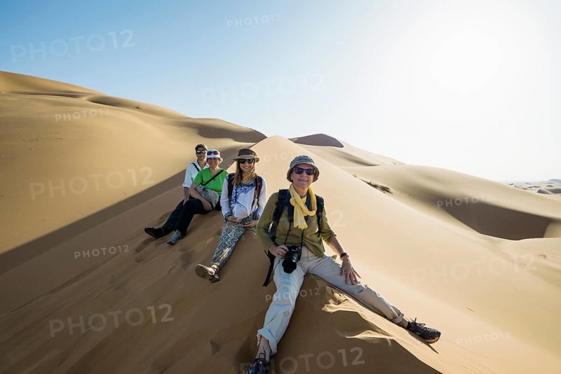Tourist group in the desert, near Merzouga, Meknès-Tafilalet region, Erg Chebbi, northern Sahara, Morocco