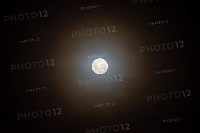 Full moon in the sky with courtyard