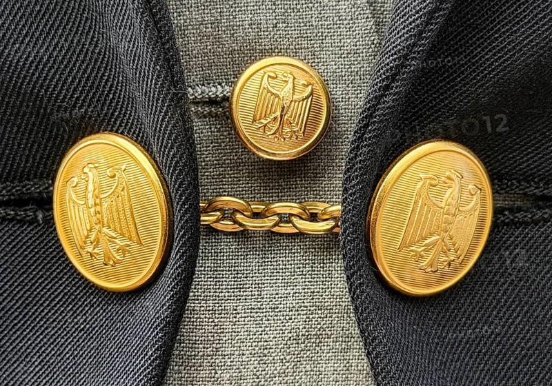 Custom tailcoat for woman since 1989, grey tailcoat with vest and golden buttons with federal eagle for hall service in the Bundestag, Germany, detail