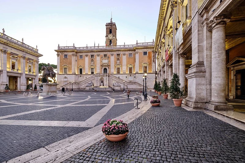 Palazzo Nuovo, Senators' Palace (Palazzo Senatorio), Conservators' Palace (Palazzo dei Conservatori) in front of sunrise, Piazza del Campidoglio on the Capitoline Hill, Capitoline Square, Rome, Lazio, Italy