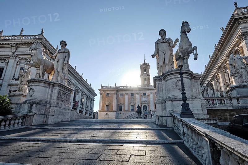 Staircase leading to the Capitoline Square, Statues of the Dioscuri Castor and Pollux, Piazza di Campidoglio in the morning light, Palazzo Senatorio, Palazzo dei Conservatori, Rome, Lazio, Italy