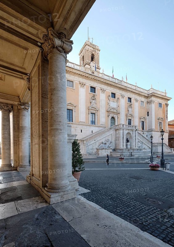 Columns of the Palazzo Nuovo in the morning light, behind the Senators' Palace (Palazzo Senatorio), Piazza del Campidoglio on the Capitoline Hill, Capitoline Square, Rome, Lazio, Italy