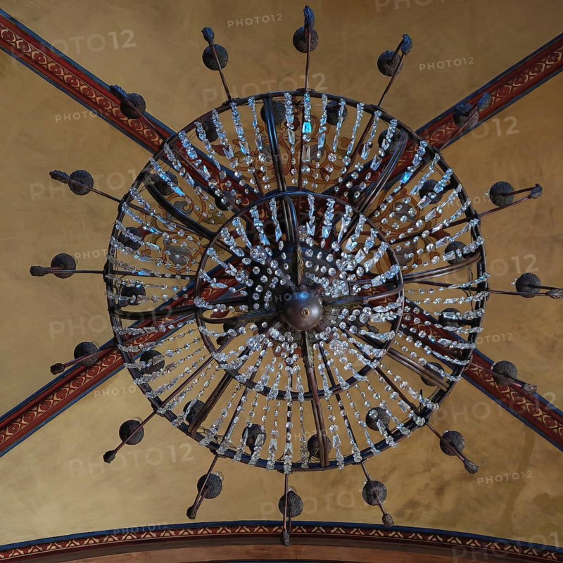 Detail of a luxurious chandelier on a decorated ceiling, Batumi, Georgia