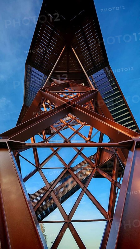 View of a metallic observation tower with geometric shapes under a blue sky, Pressecker Knock, Upper Franconia