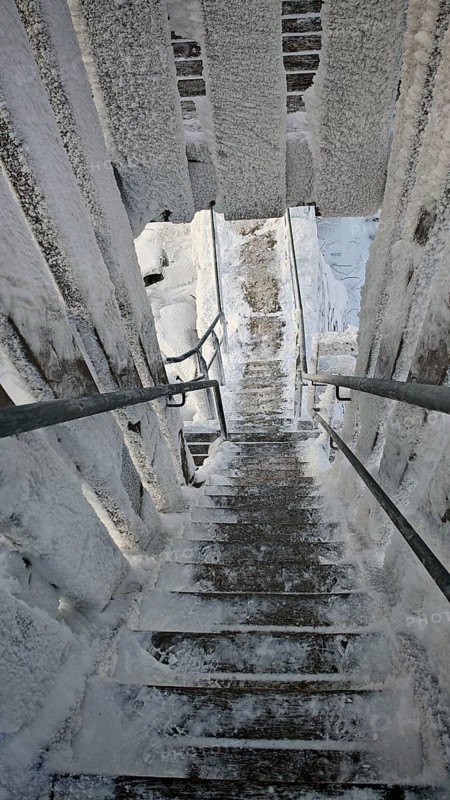 Snowy, icy staircase offers interesting perspective and structural details, Schneeberg, Fichtelgebirge, Bavaria