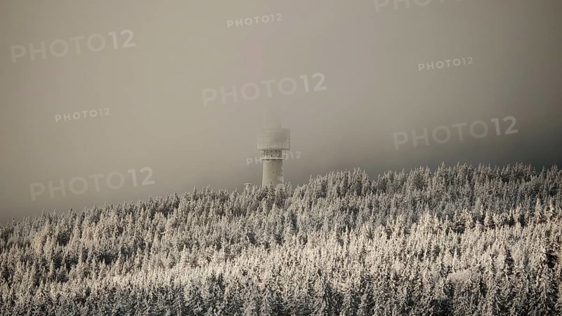 Snowy forests with a tower disappearing in fog, view from Nusshardt towards Bacöfele Schneeberg, view from Nusshardt towards Bacöfele on Schneeberg, Fichtelgebirge, Bavaria