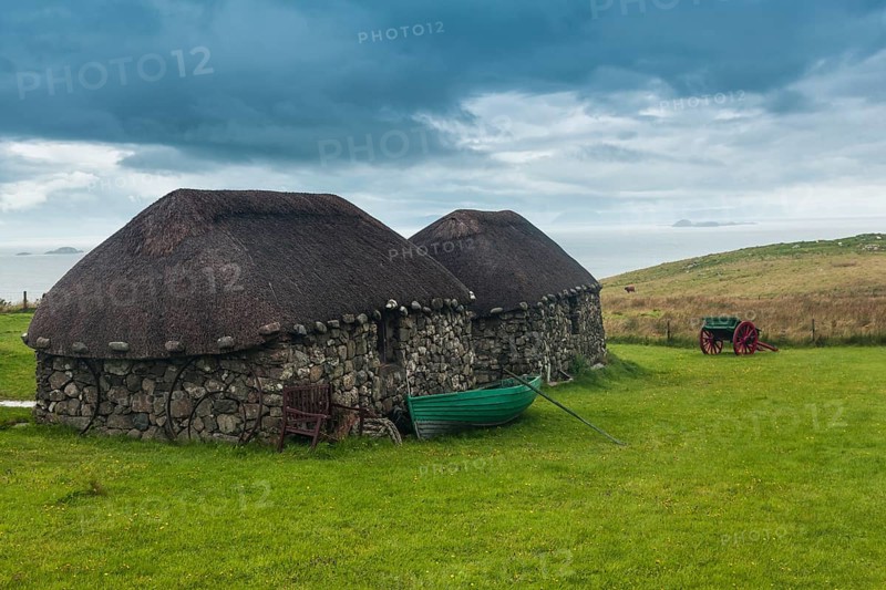 Isle of Skye, Scotland, UK. Traditional houses blackhouse village built by farmers in the difficult climate of the island at the Museum of Island Life