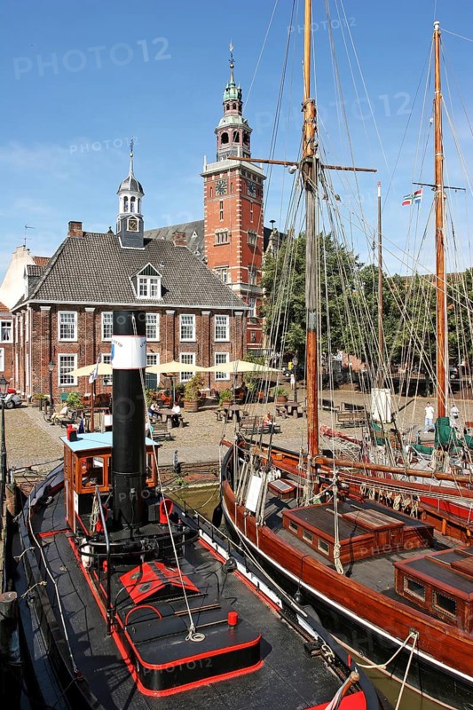 Museum harbour, museum ships, historic scales and the town hall, Leer, East Frisia, Germany