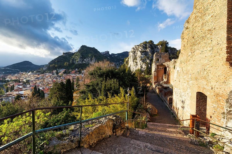 Greek Theatre, Teatro Greco, view of picturesque town, hills and mountains, panoramic view, Taormina, Sicily, Italy