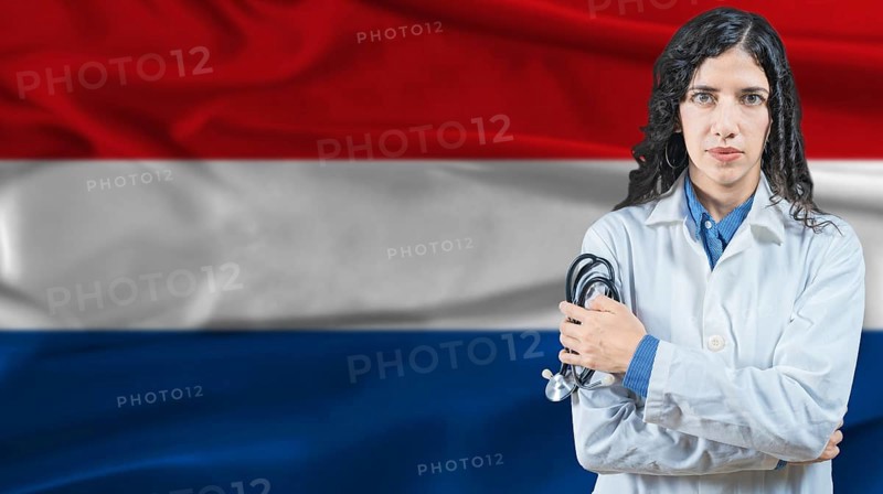 Dutch national health system, Medical professional on Netherlands flag background