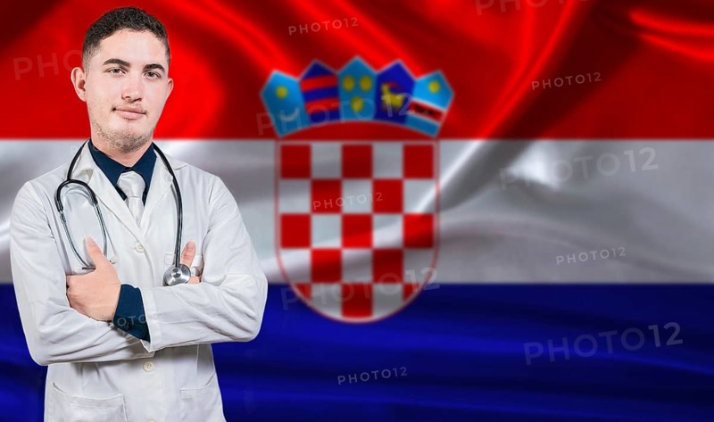 Portrait of medical professional on Croatia flag background. Croatian national health system