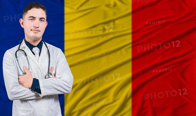 Portrait of medical professional on Romania flag background. Romanian national health system