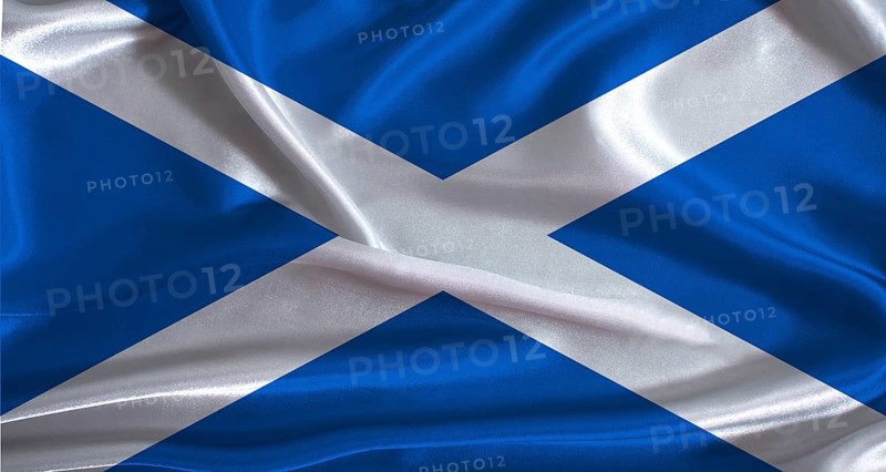 Scotland flag with cloth textured background. National flag of Scotland with realistic texture